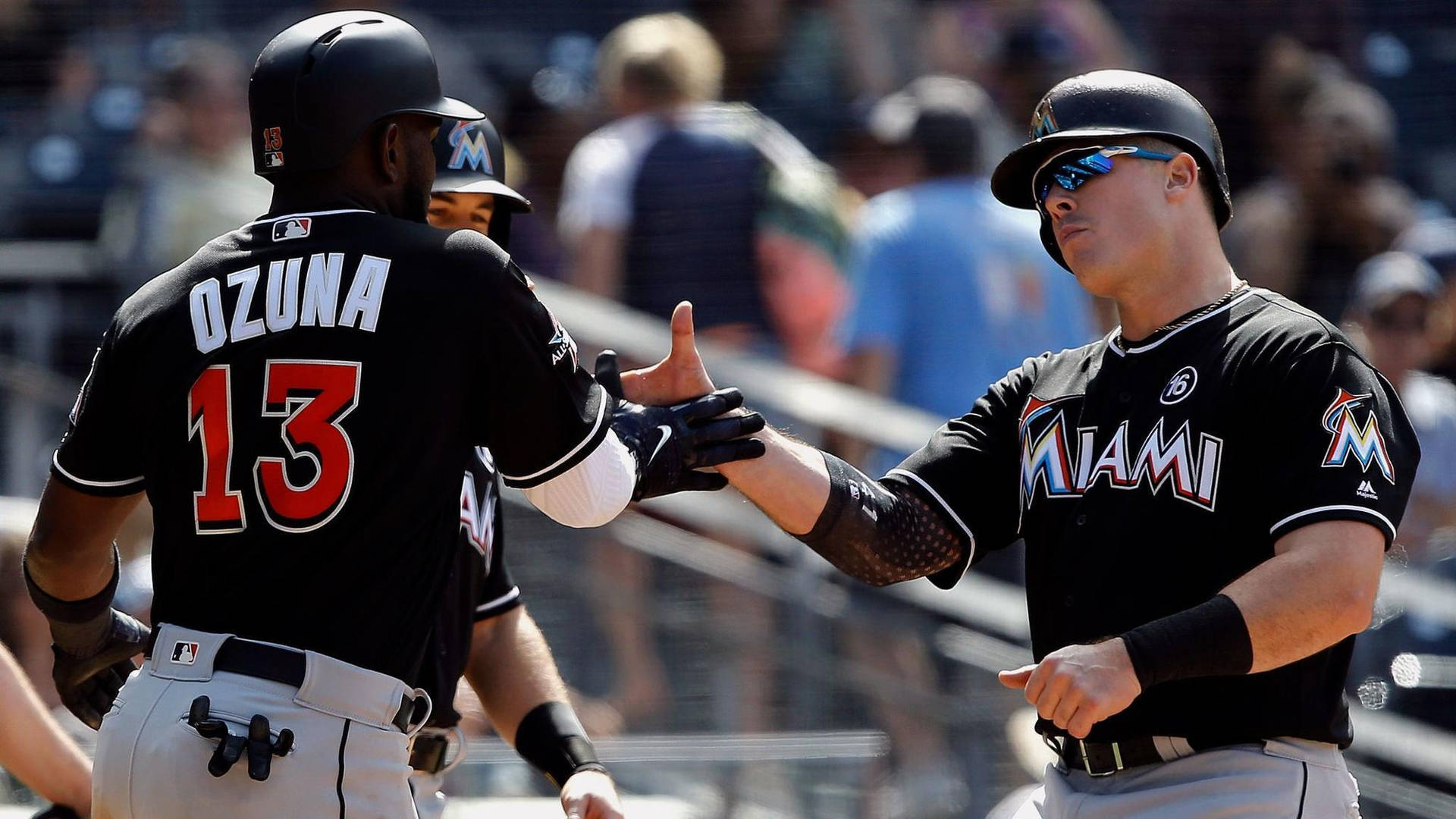 Marcell Ozuna Doing Handshake With Teammate