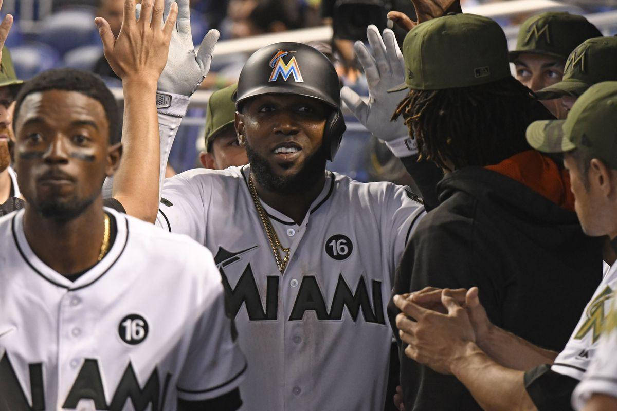 Marcell Ozuna Giving High Fives