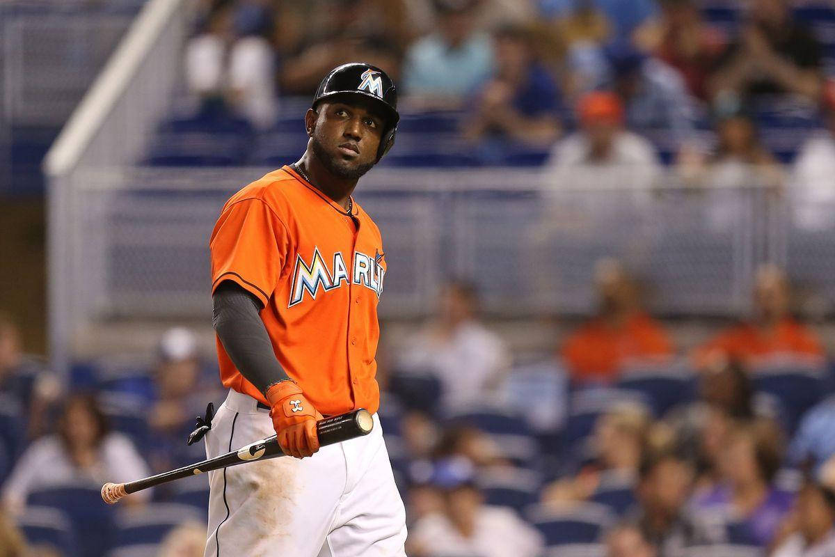 Marcell Ozuna Holding A Black Baseball Bat