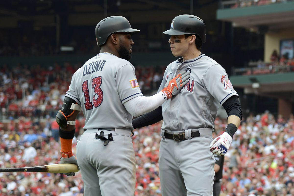 Marcell Ozuna Tapping Teammate's Chest