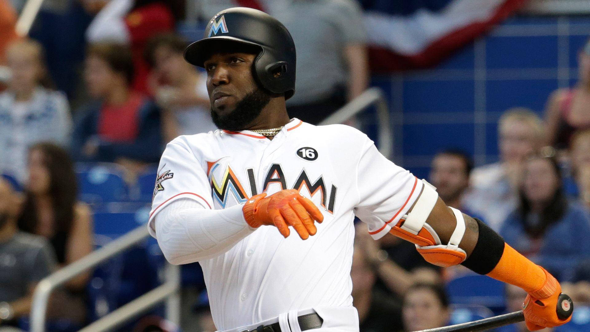 Marcell Ozuna With Orange Baseball Gloves