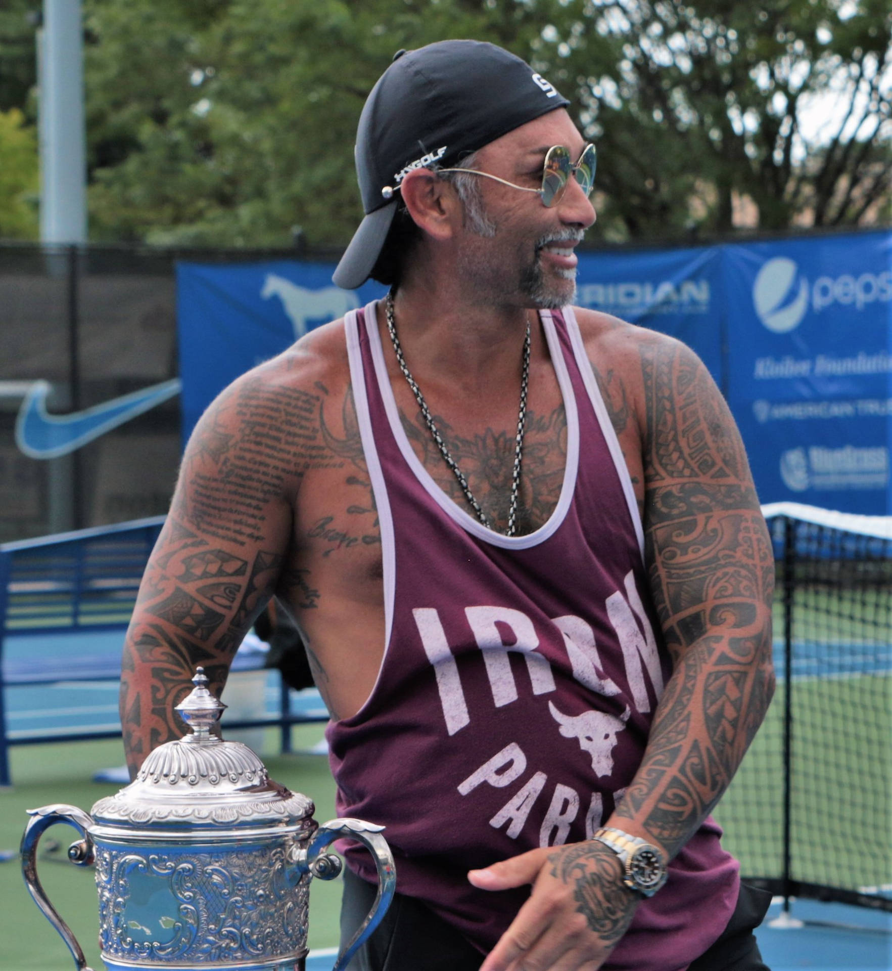 Marcelo Rios Triumphantly Holding A Trophy