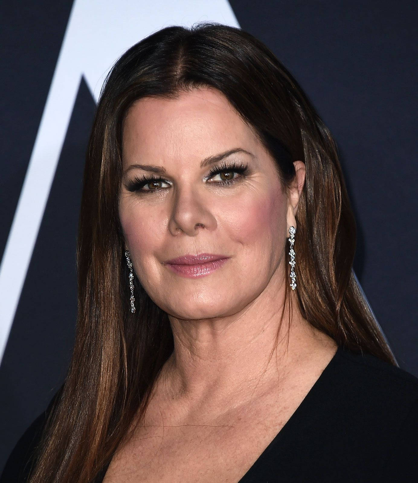 Marcia Gay Harden Exuding Elegance In A Portrait Session Background