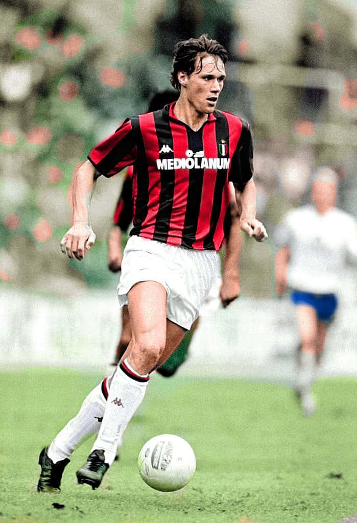 Marco Van Basten Kicking Ball Background