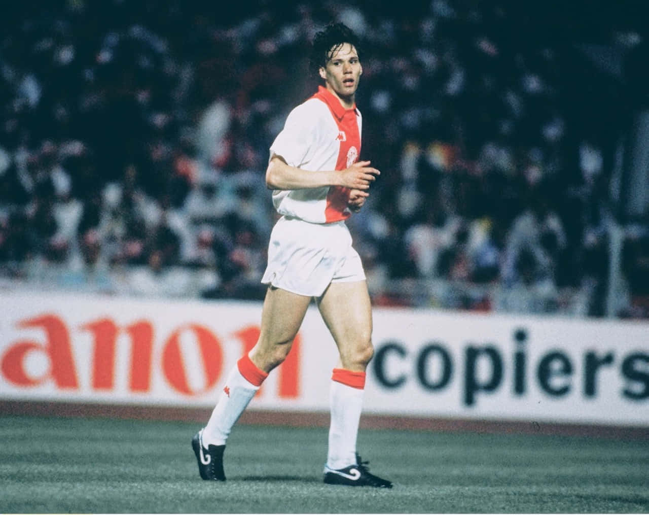Marco Van Basten Running On Field Background