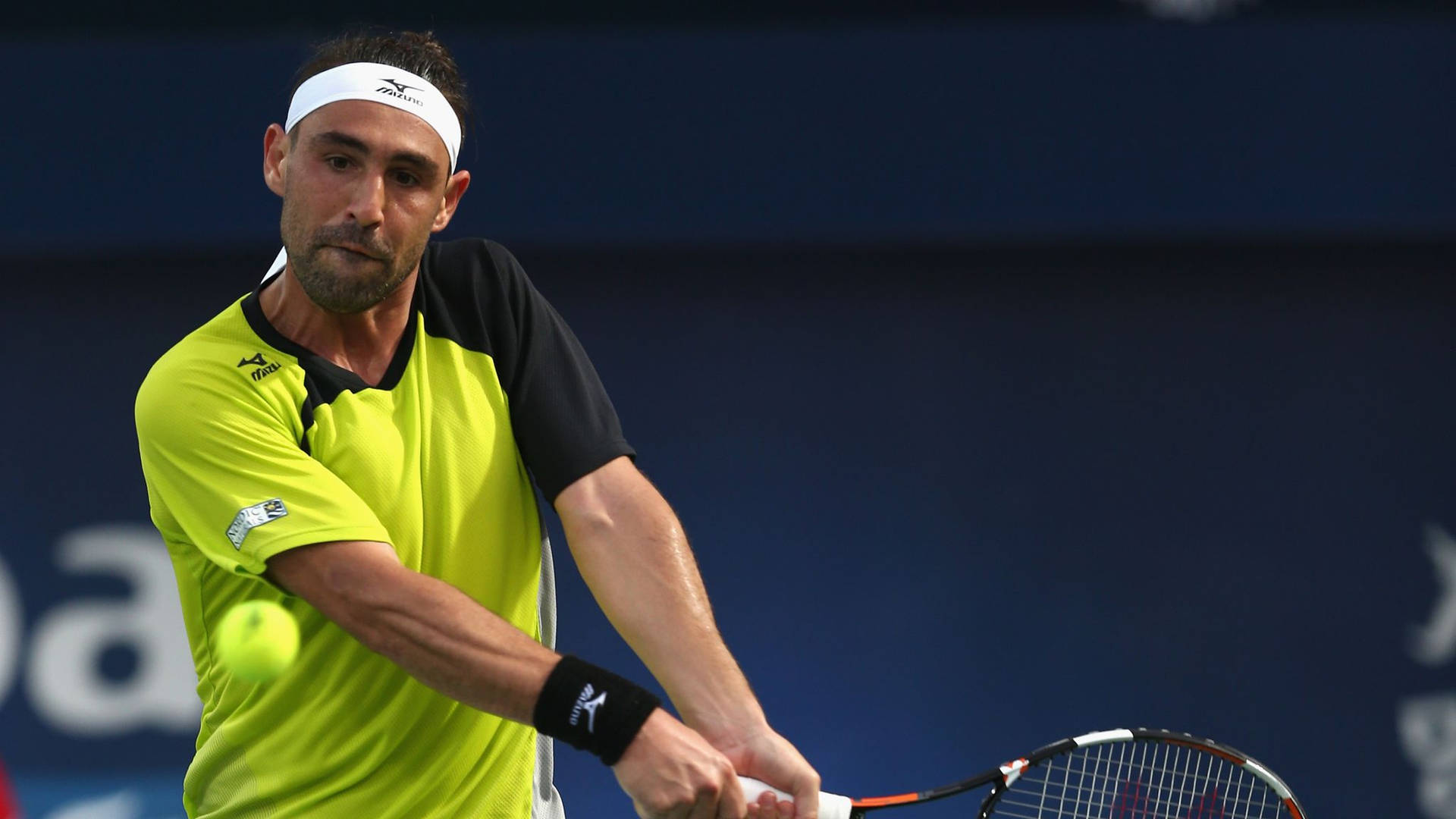 Marcos Baghdatis Intensely Gripping His Tennis Racket Background