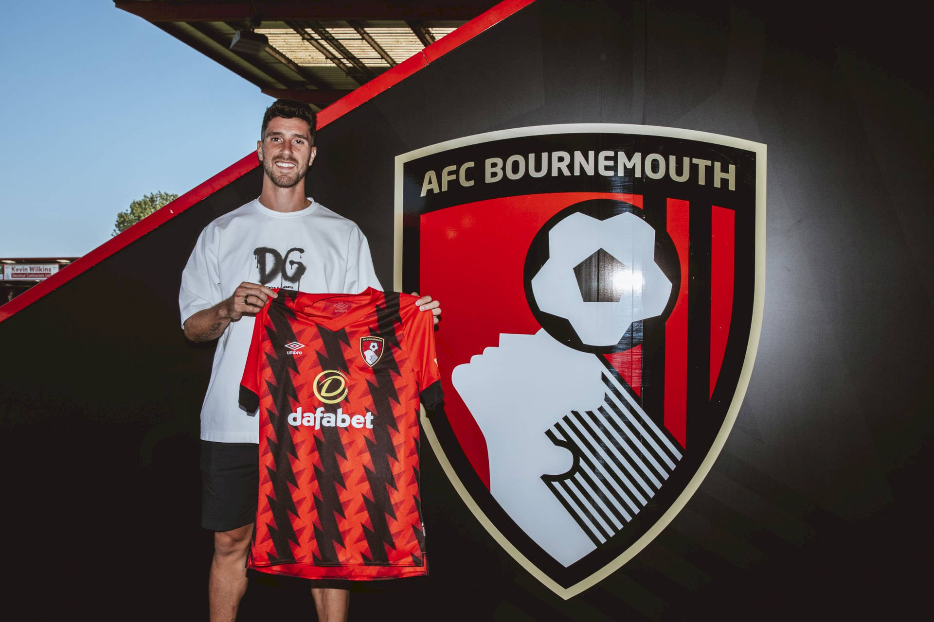 Marcos Senesi With Afc Bournemouth Shirt Background