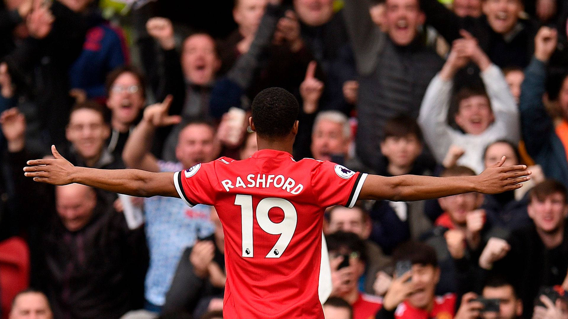 Marcus Rashford Arms Wide Open Background