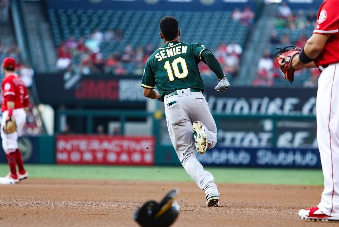 Marcus Semien In Green Uniform Running