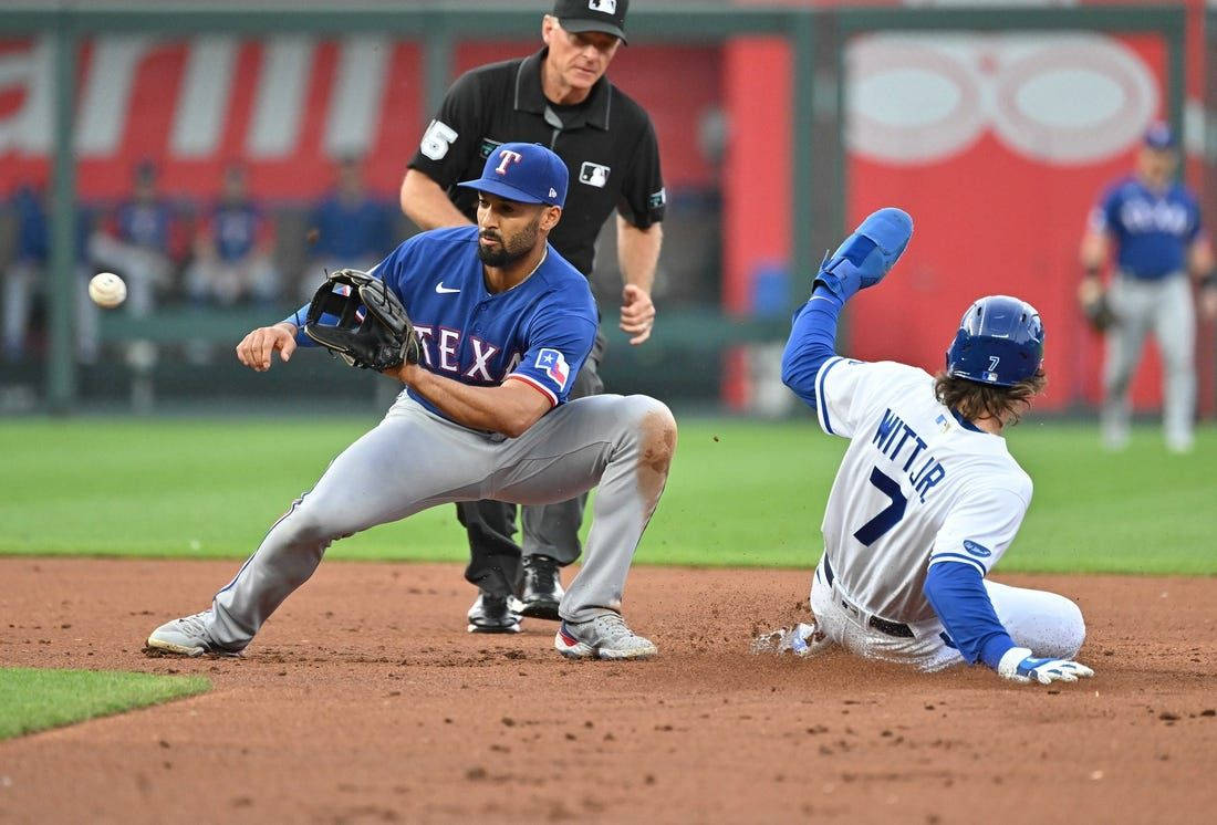 Marcus Semien Knee Bent Catching Ball Background