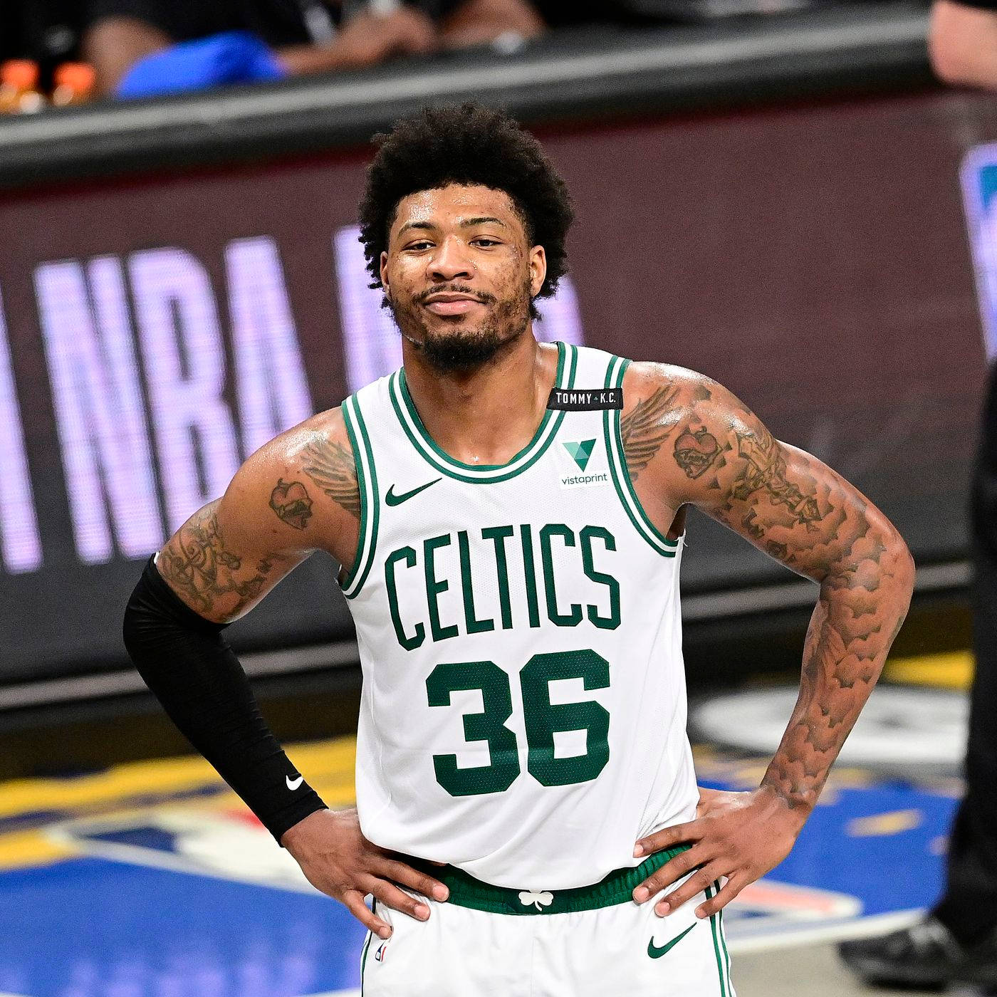Marcus Smart Glances To Other Members Background