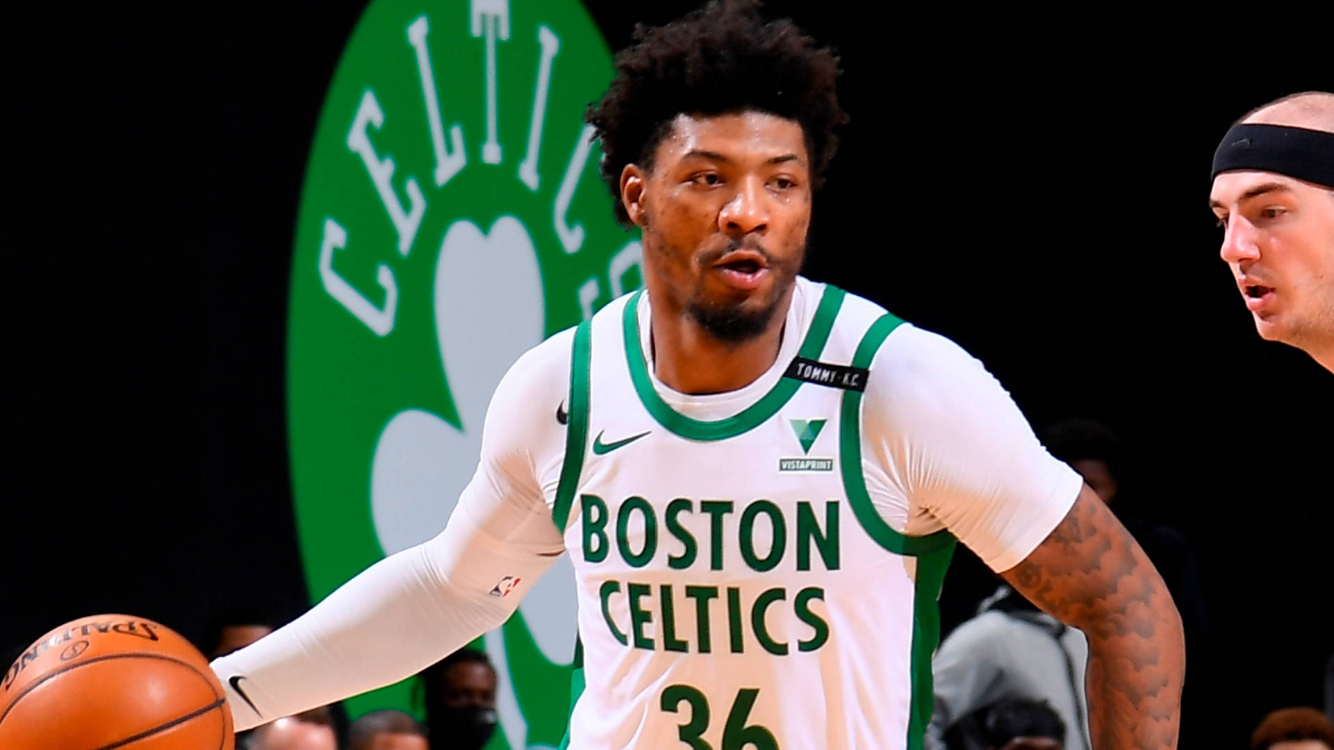 Marcus Smart Mightily Strives For Layup Background