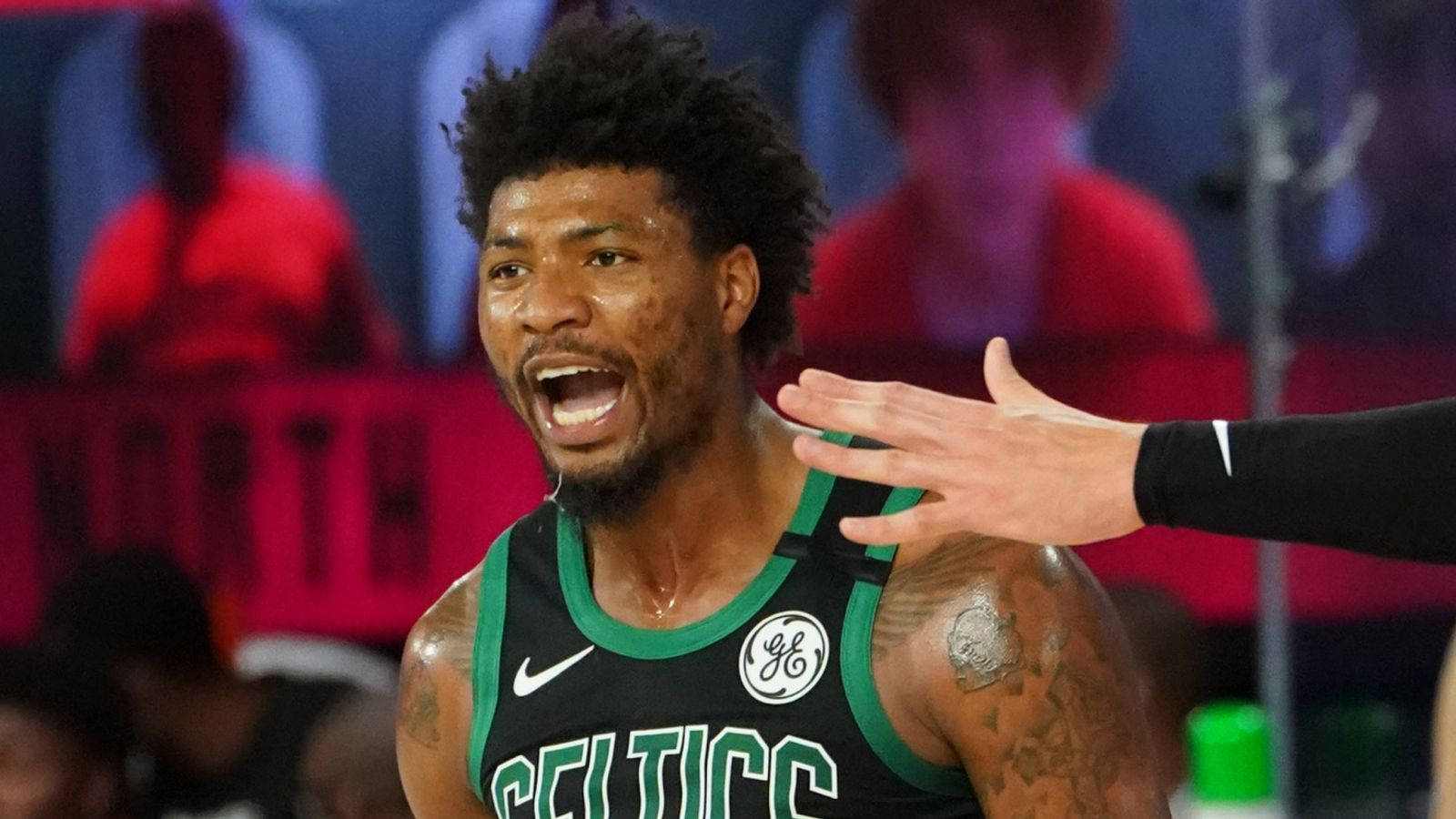 Marcus Smart Yells Out For Victory Background