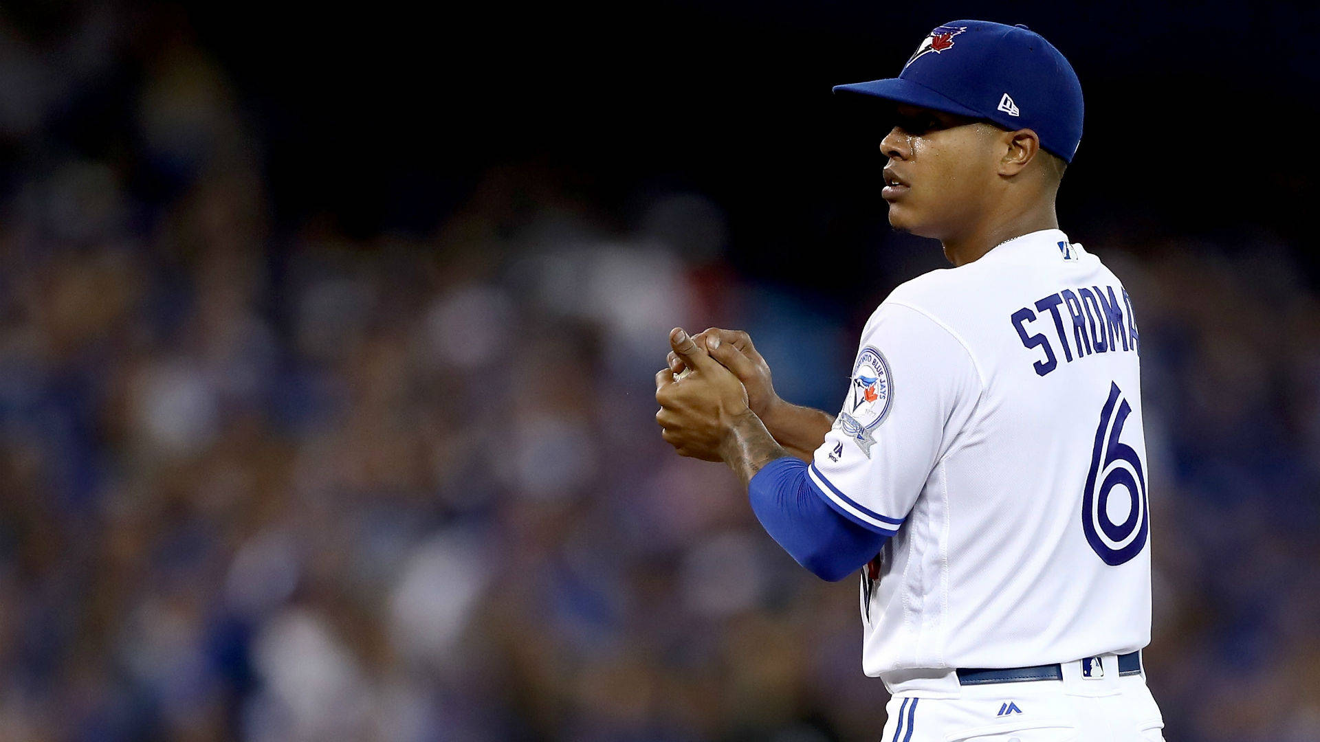 Marcus Stroman Holding Baseball Background