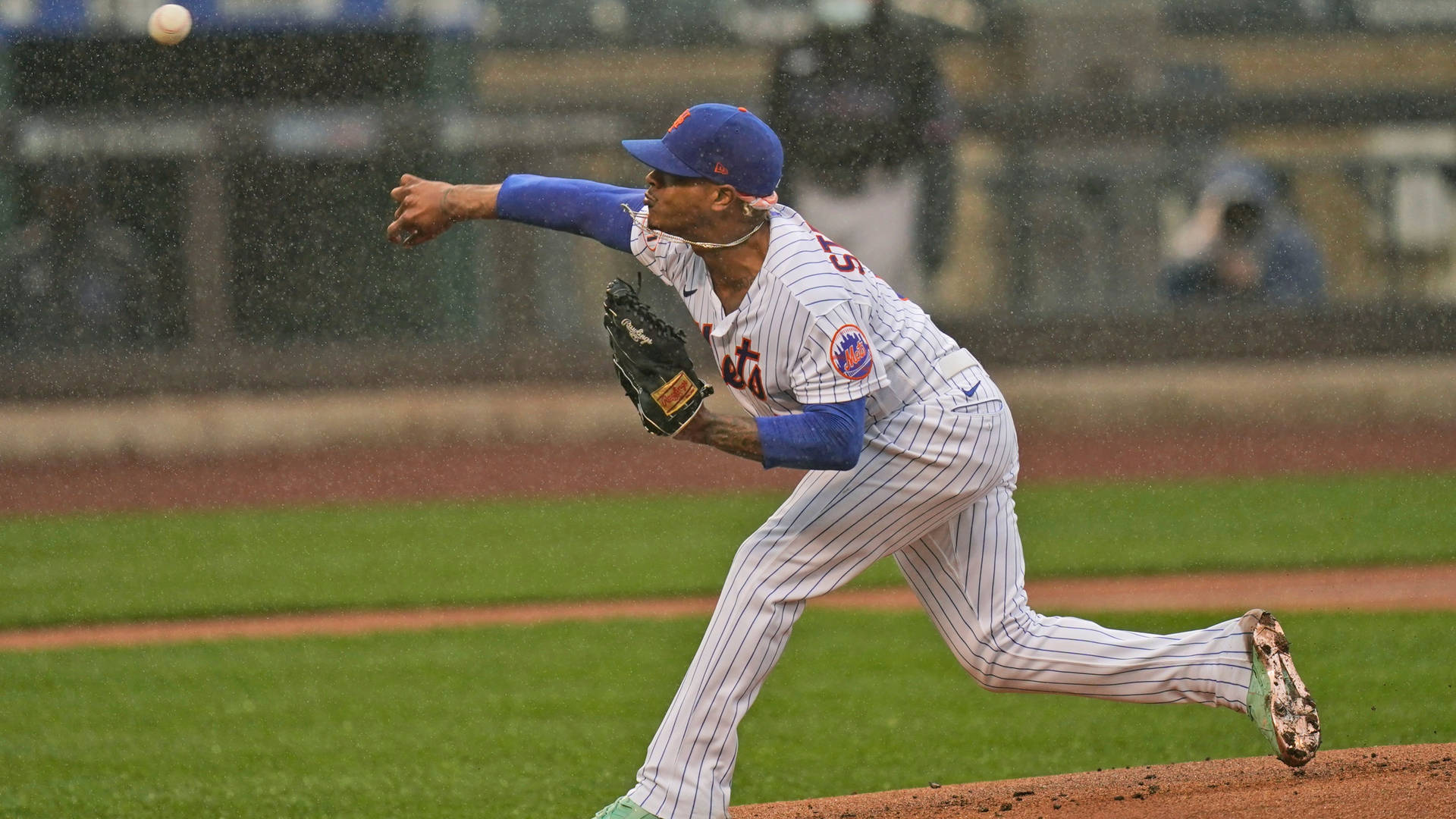 Marcus Stroman Under The Rain Background