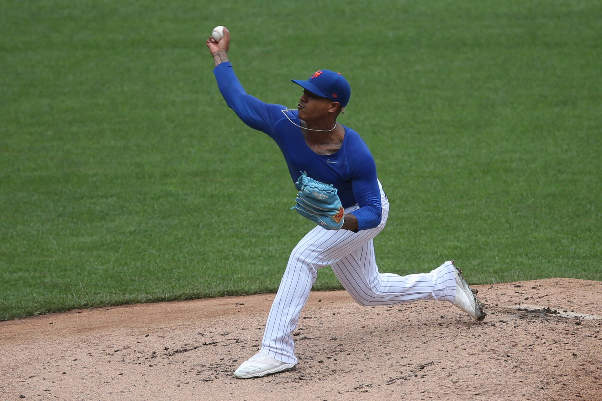 Marcus Stroman Wearing Blue Shirt Background