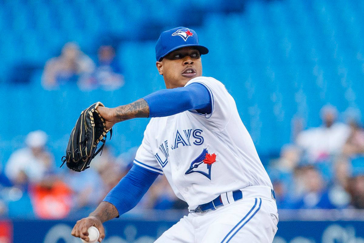 Marcus Stroman With Blue Baseball Cap Background