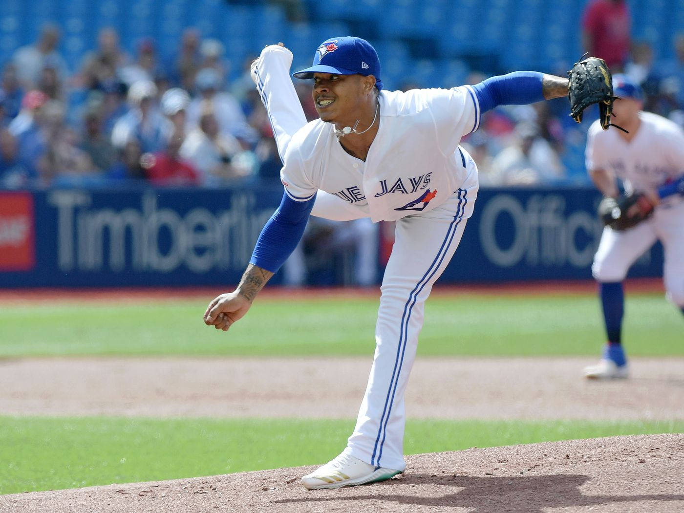 Marcus Stroman With Leg Raised Background