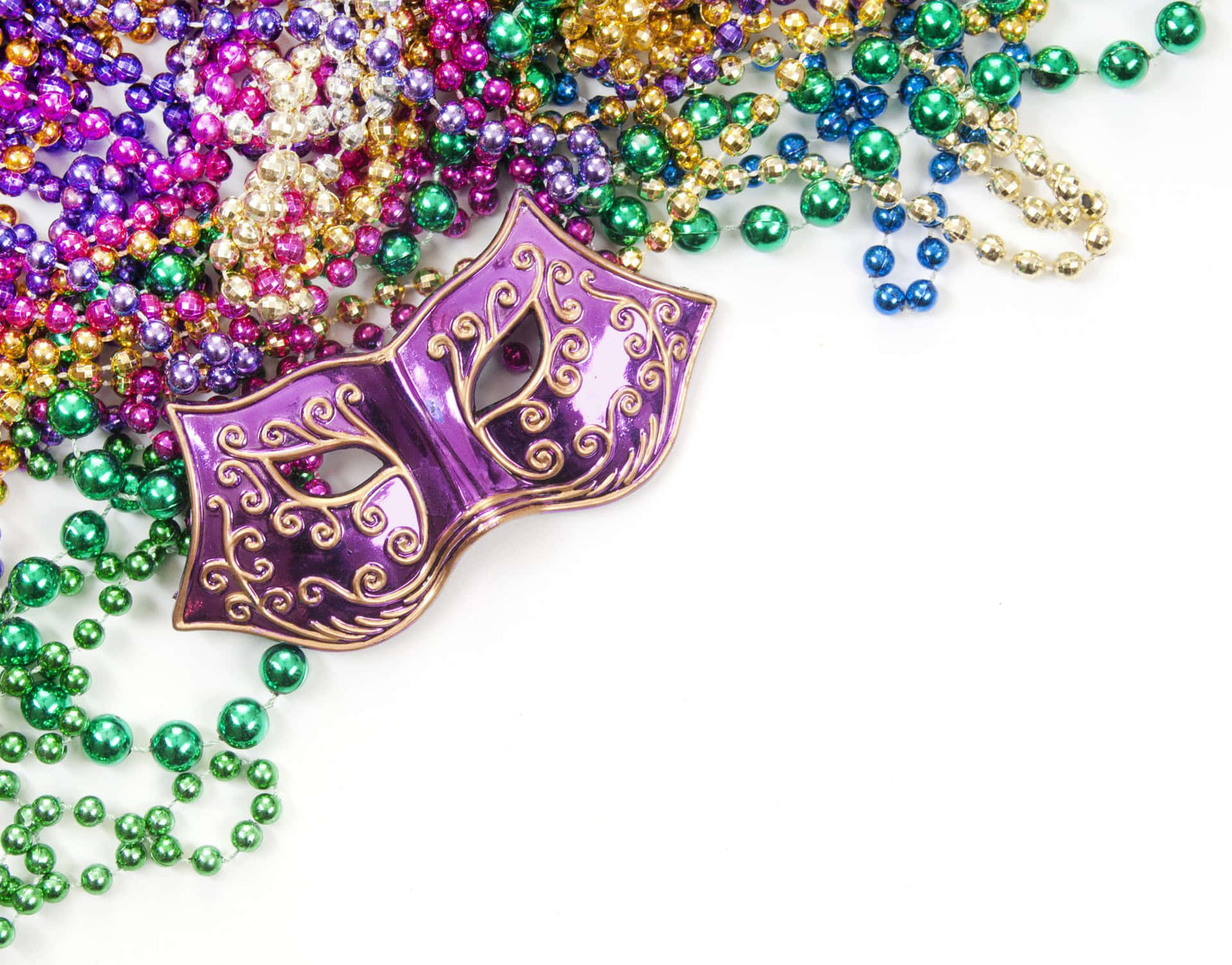Mardi Gras Mask With Colorful Beads Jewelry Background