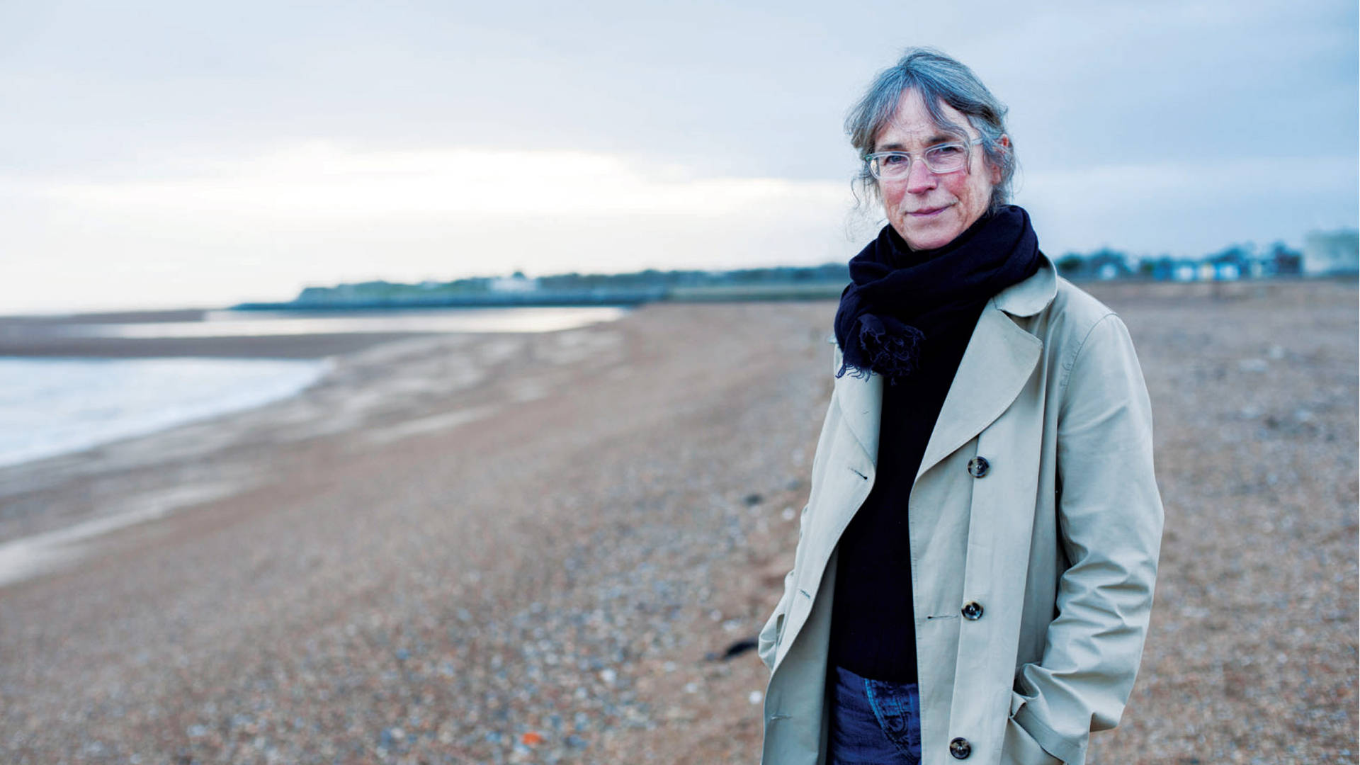 Margaret Howell Enjoying The Serene Beach Background