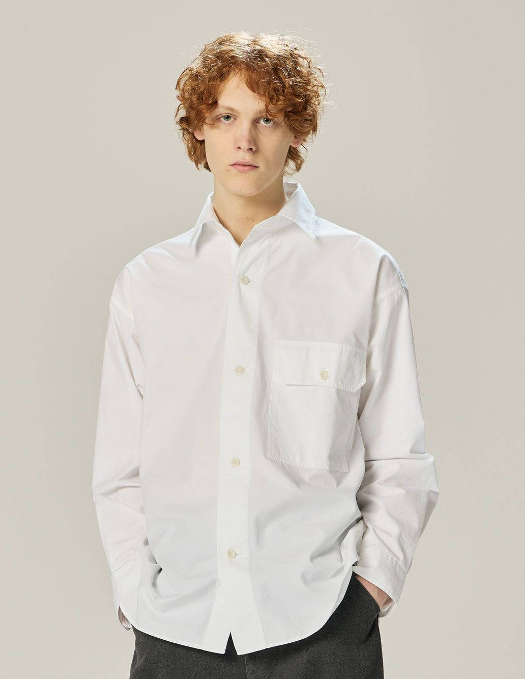 Margaret Howell Styling Clean And Minimal White Button-down Shirt Background