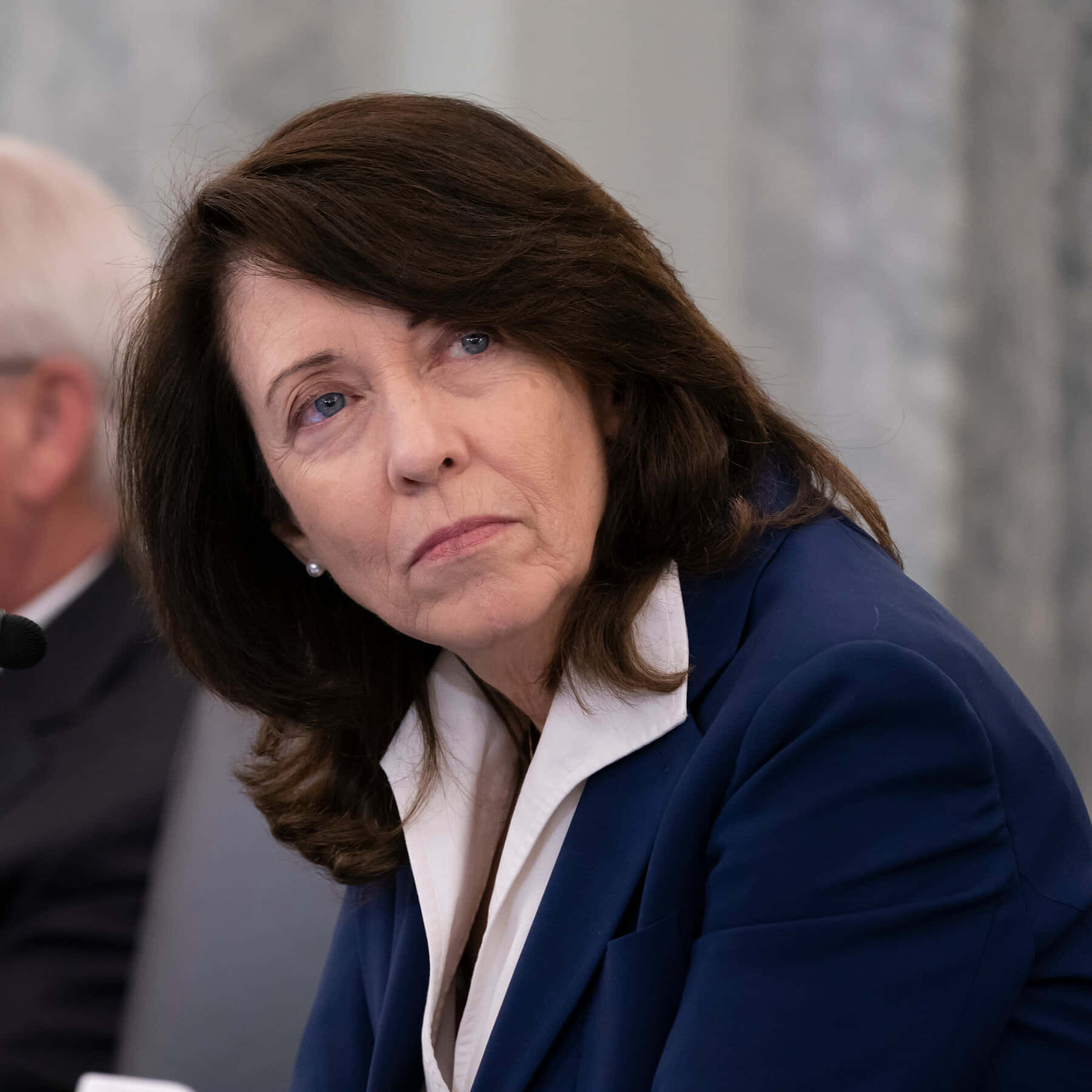 Maria Cantwell Looking Above Background