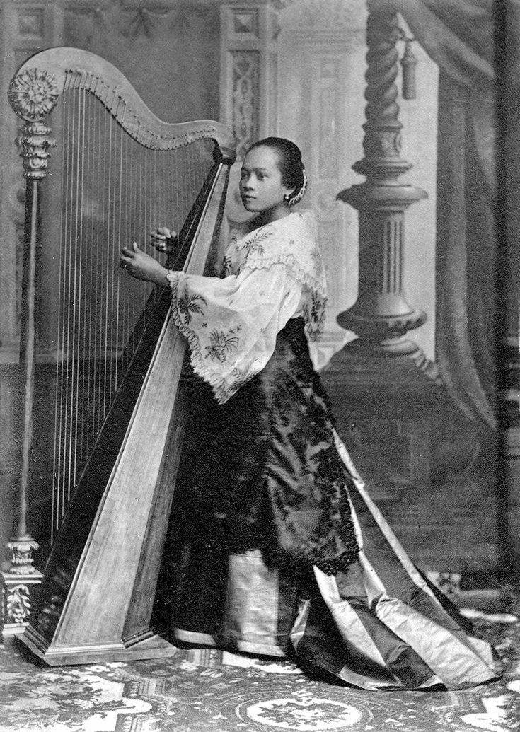 Maria Clara Playing Harp Background