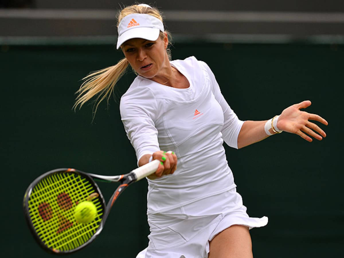 Maria Kirilenko Executing A Forehand Stroke In Tennis Background