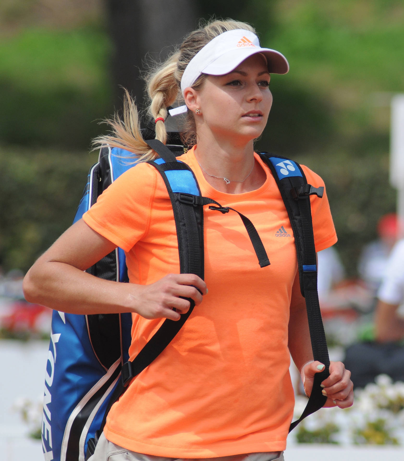 Maria Kirilenko Holding A Blue Tennis Bag Background