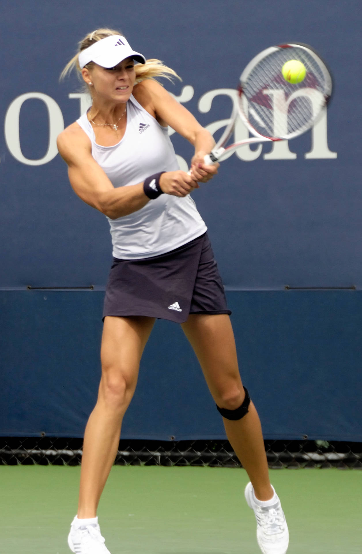 Maria Kirilenko Holding Racket Both Hands Background