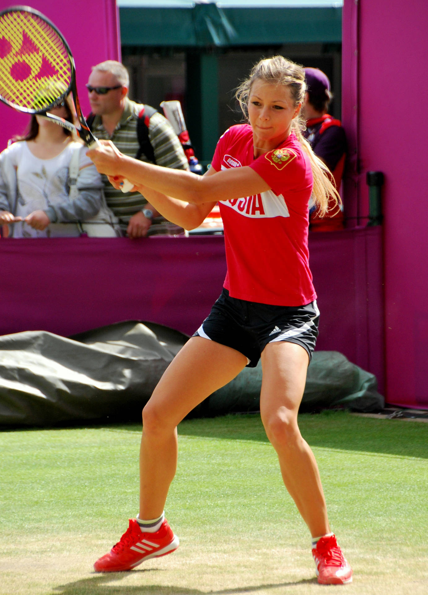 Maria Kirilenko Ready To Hit Ball Background