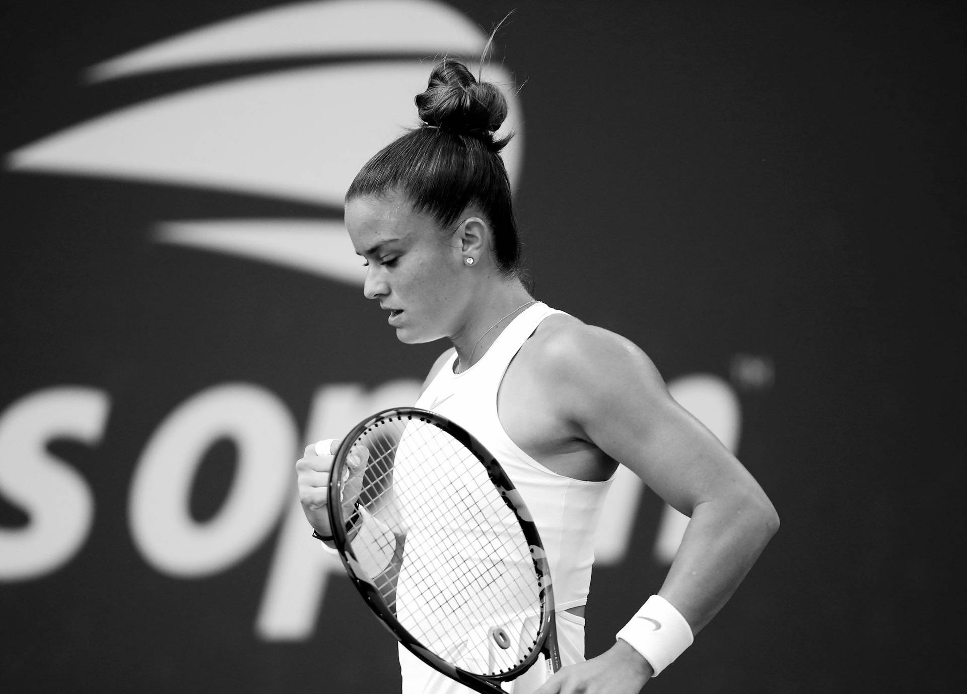 Maria Sakkari Prepared For Action On The Tennis Court Background