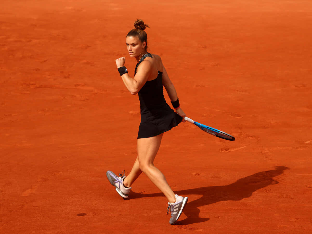 Maria Sakkari Walking Away Background