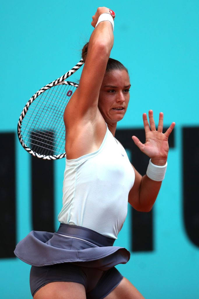 Maria Sakkari With Arm Over Head Background