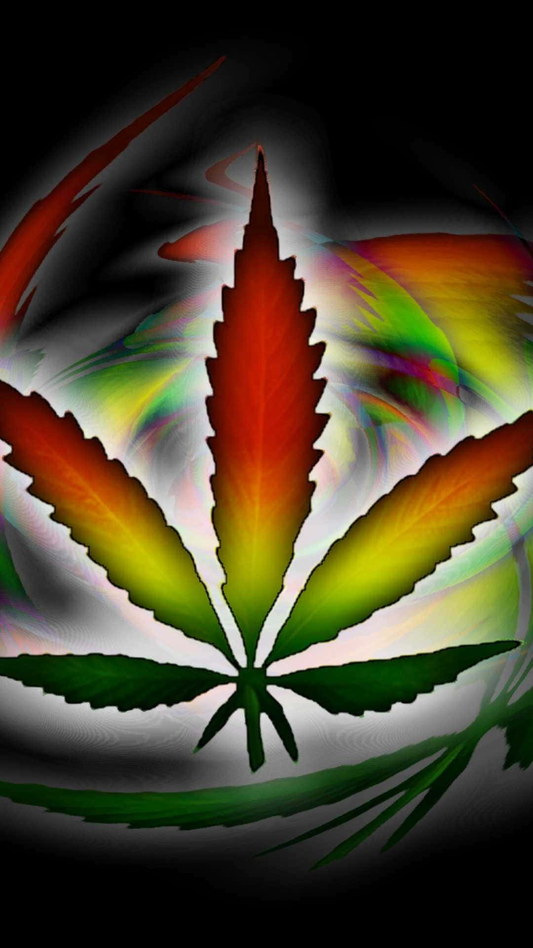 Marijuana Leaf In Rastafarian Colors Background