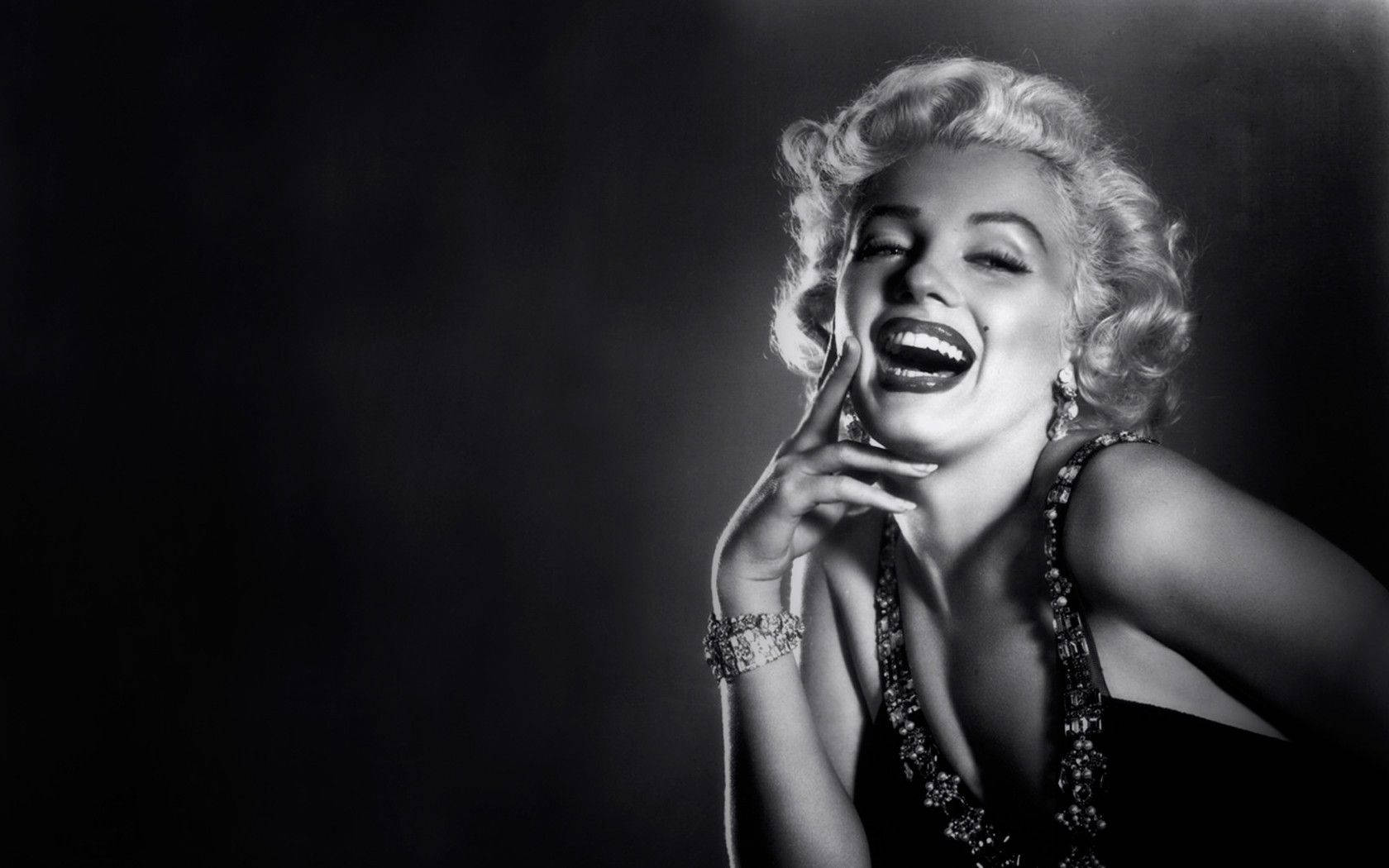 Marilyn Monroe Laughing Pose Background