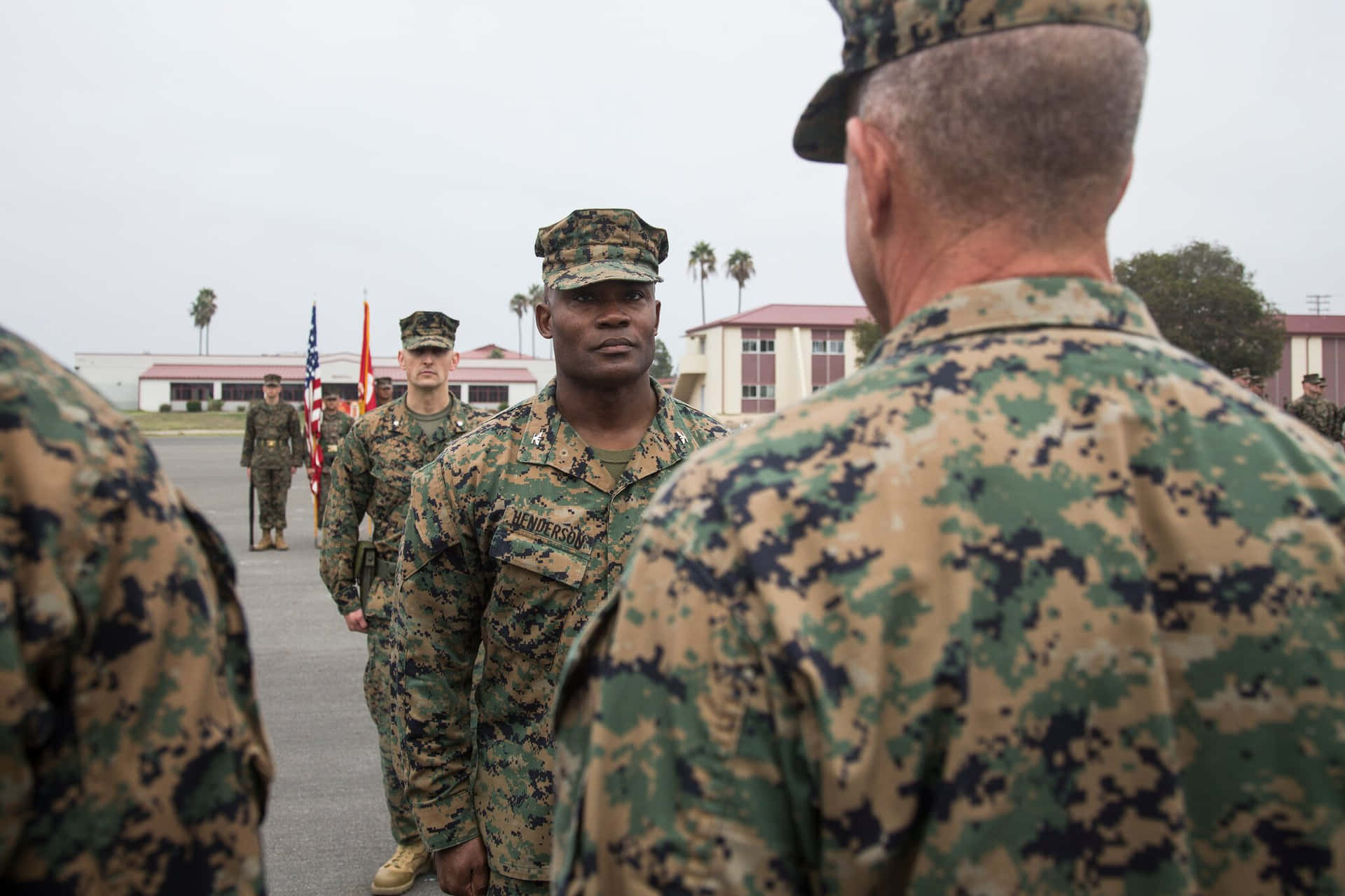 Marines In Uniform Standing In A Line Background