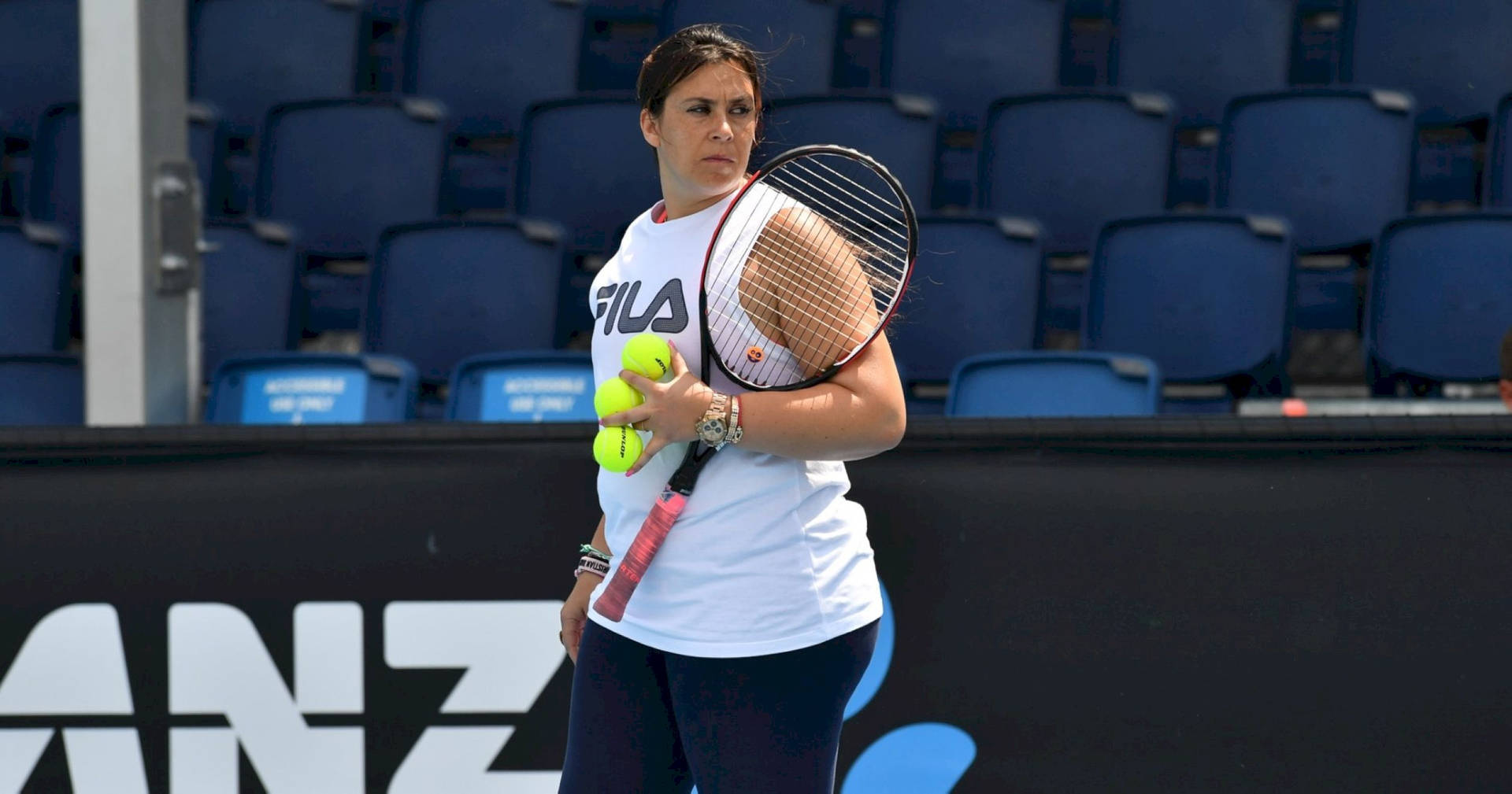 Marion Bartoli Holding Tennis Balls Background