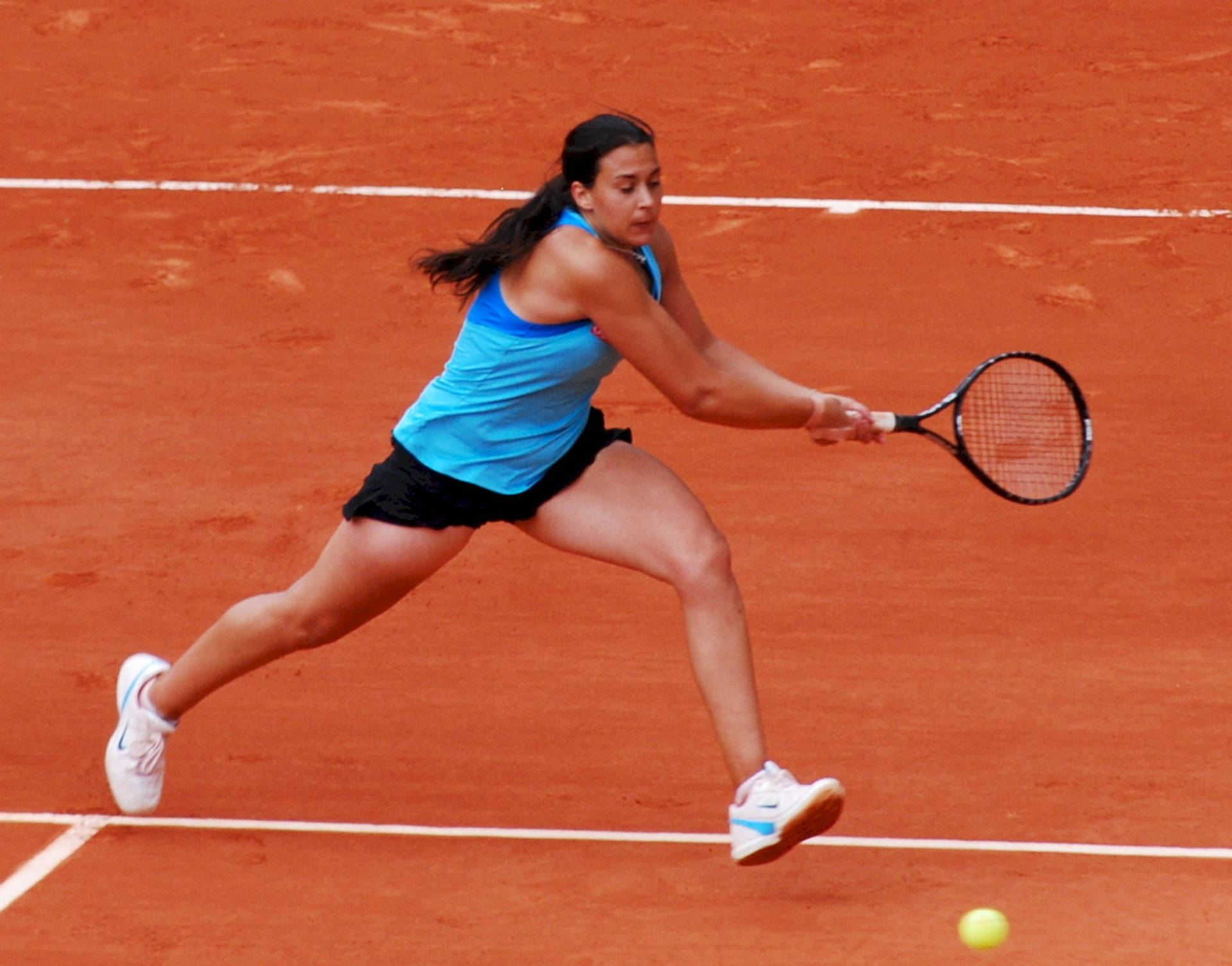 Marion Bartoli In Action On A Clay Court