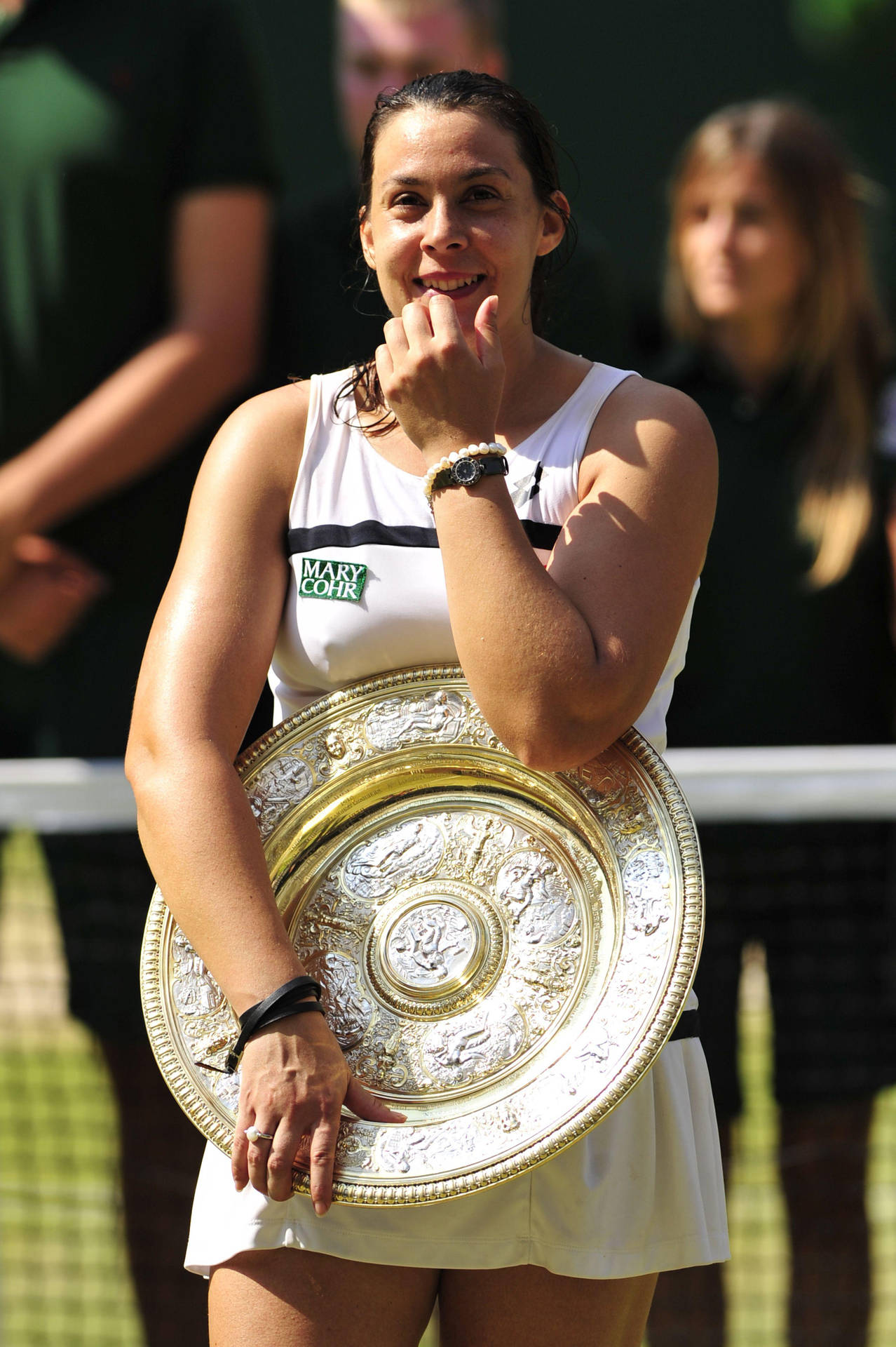 Marion Bartoli Triumphantly Holding Wimbledon Trophy