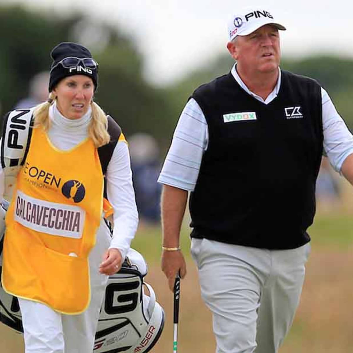 Mark Calcavecchia And His Beautiful Wife, Together At A Sports Event Background