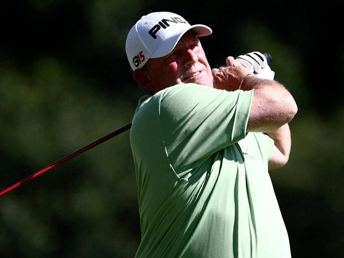 Mark Calcavecchia In Light Green Shirt Background