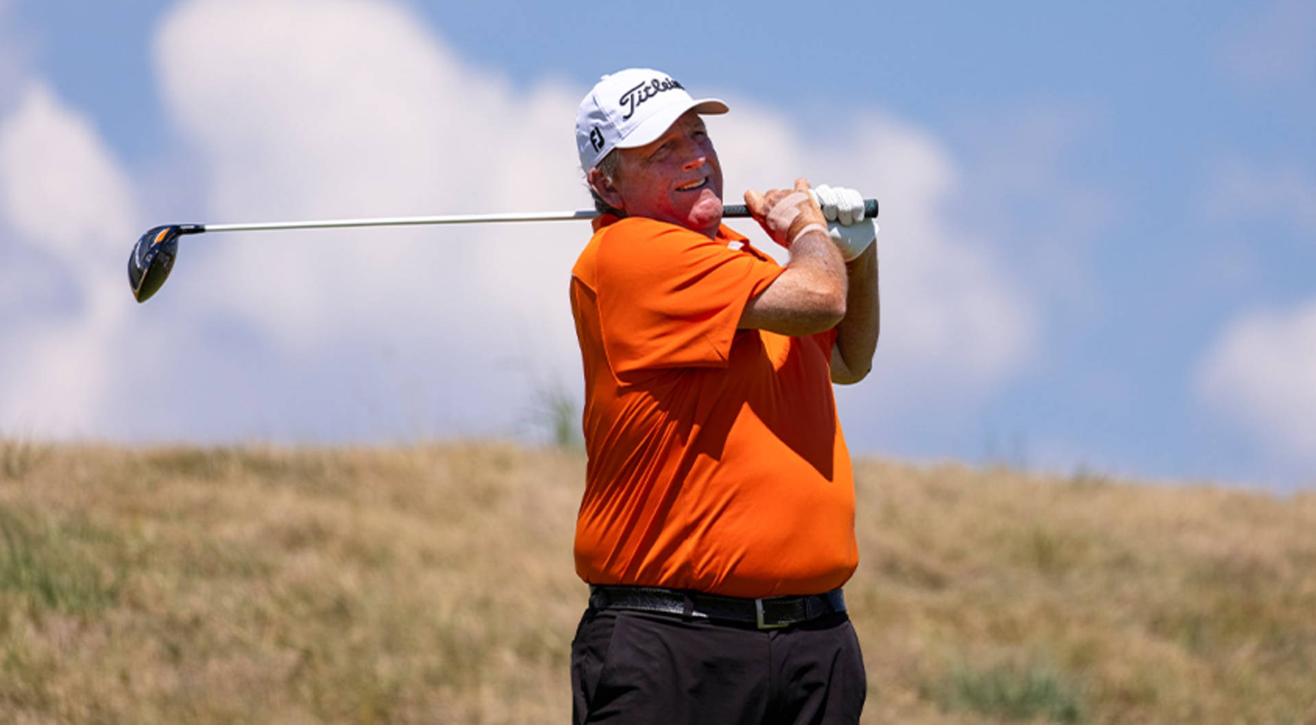 Mark Calcavecchia In Vibrant Orange Polo Shirt Background