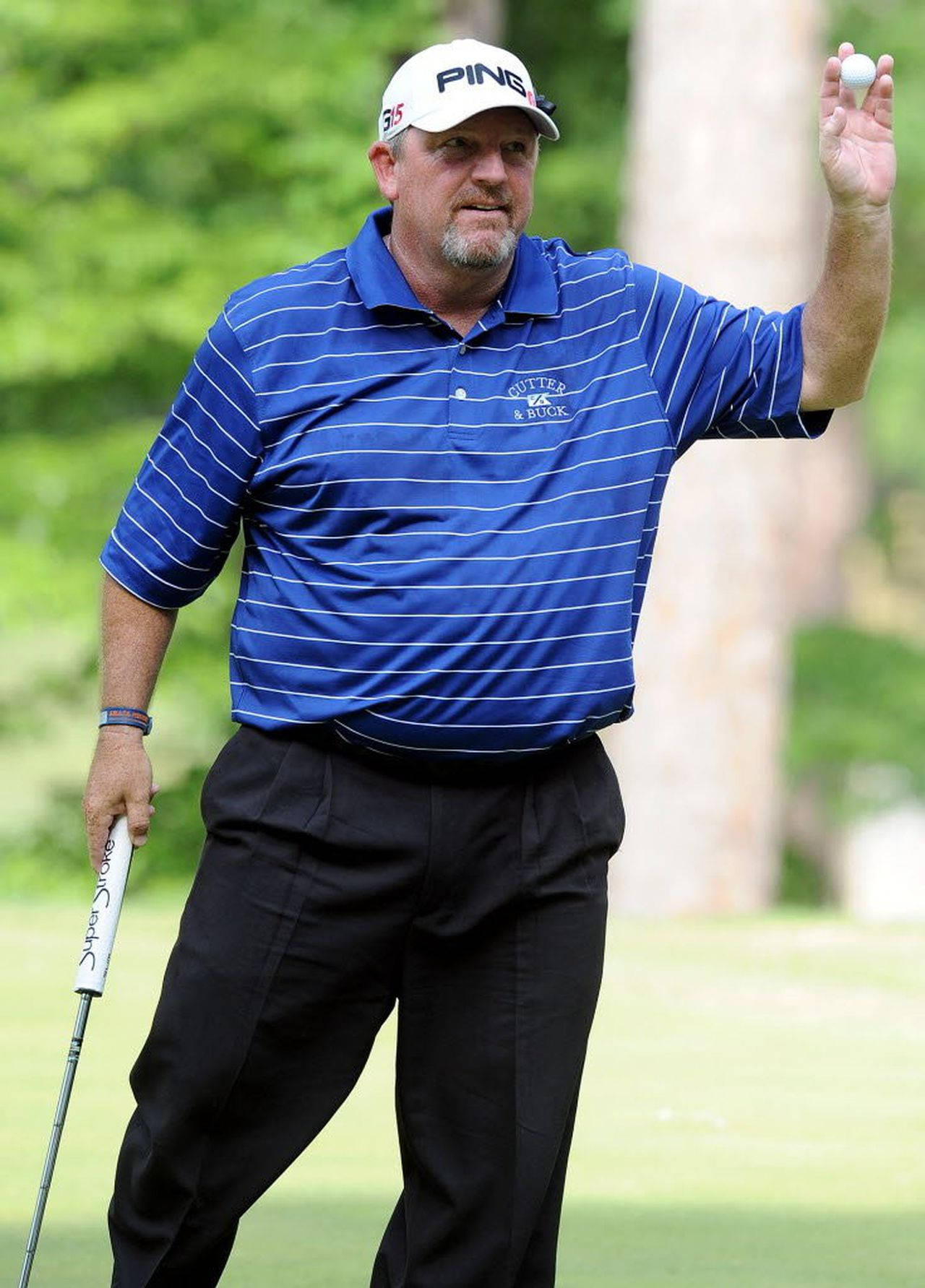 Mark Calcavecchia Showing His Golf Ball Background