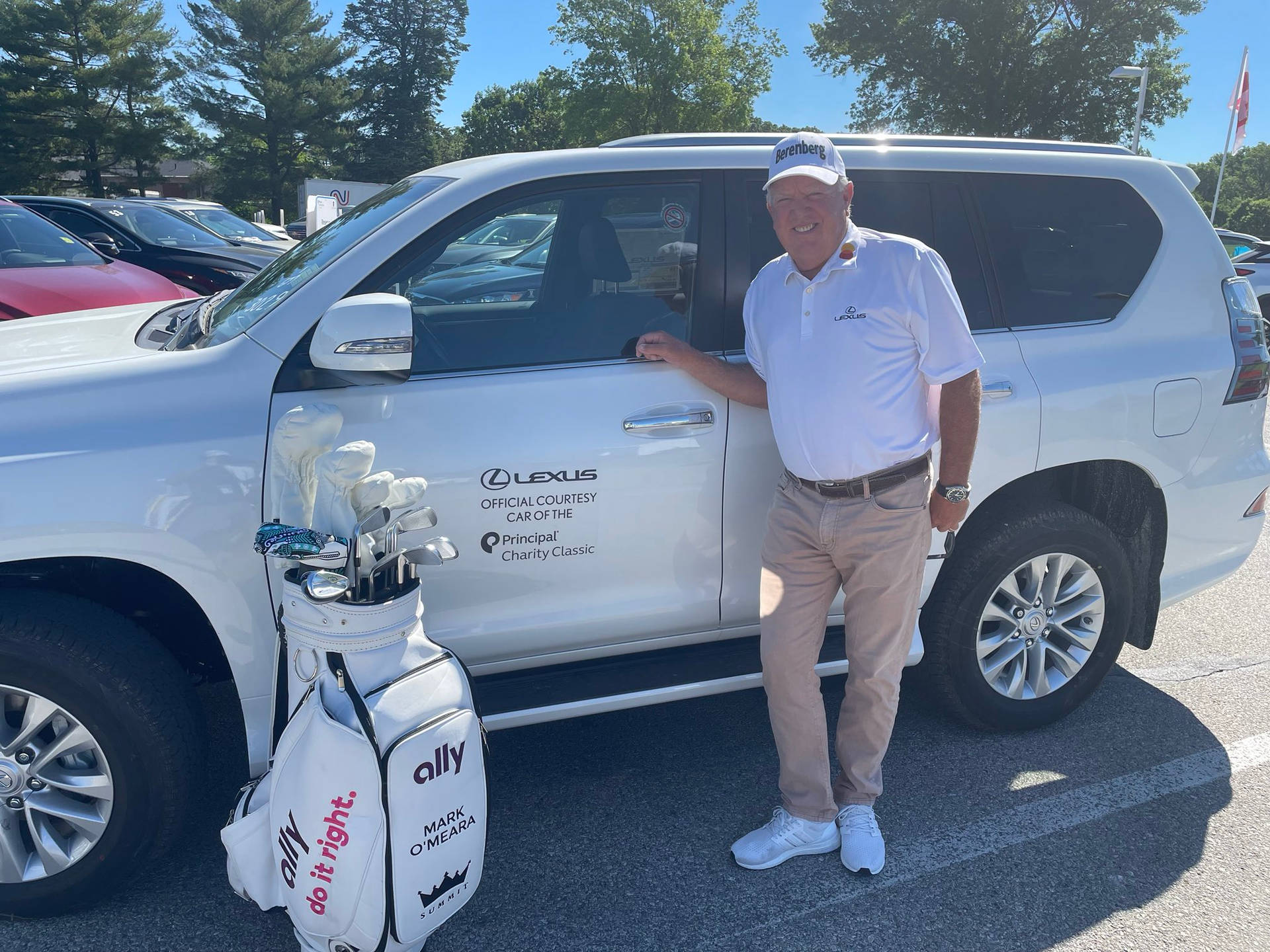 Mark O'meara Posing With Lexus Suv Background