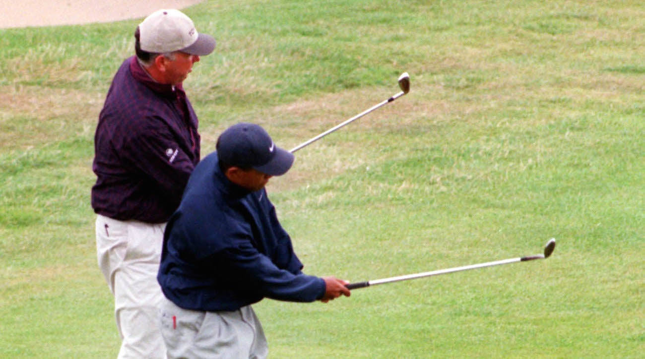 Mark O'meara Tiger Woods Holding Golf Clubs Background