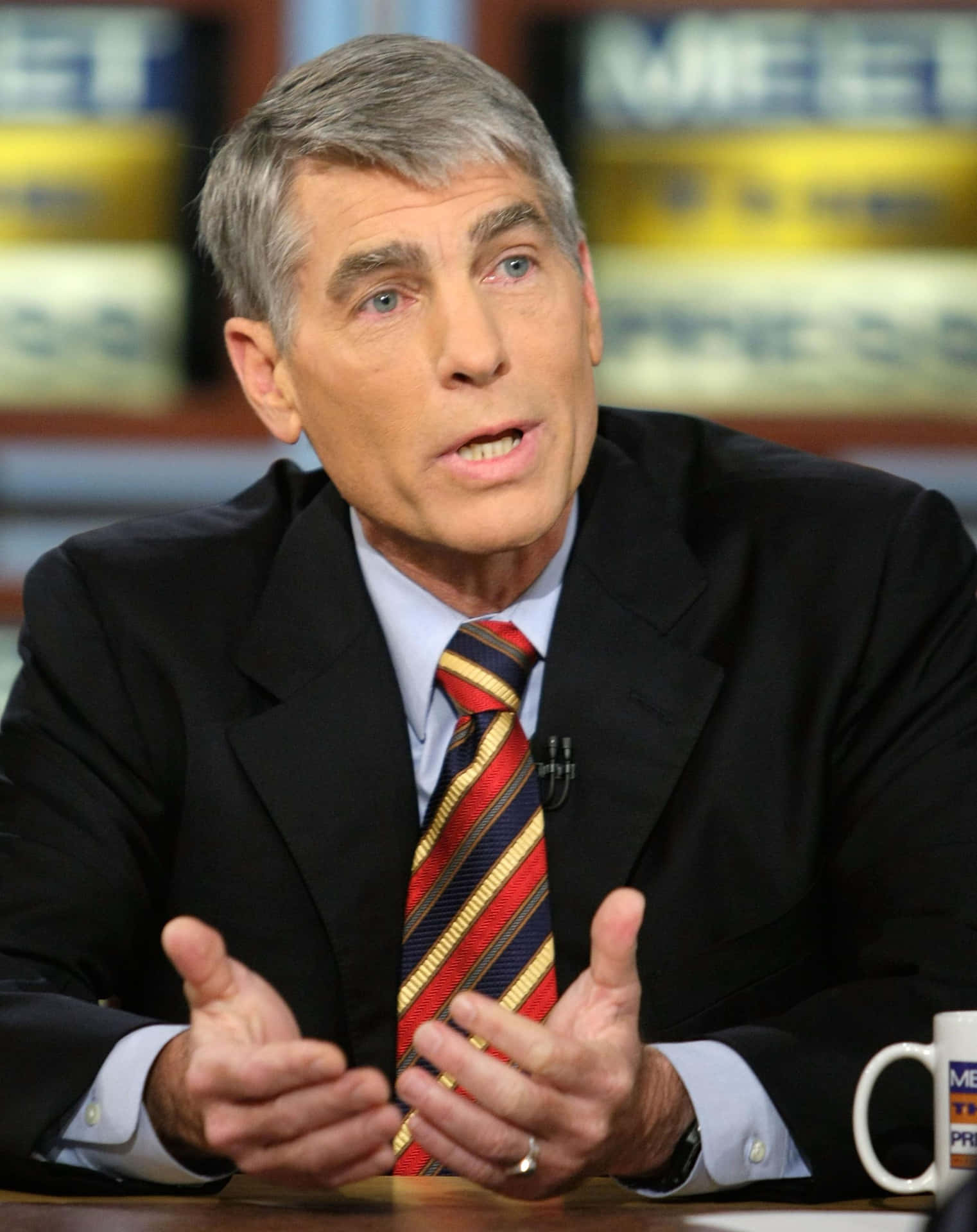 Mark Udall In Suit Background