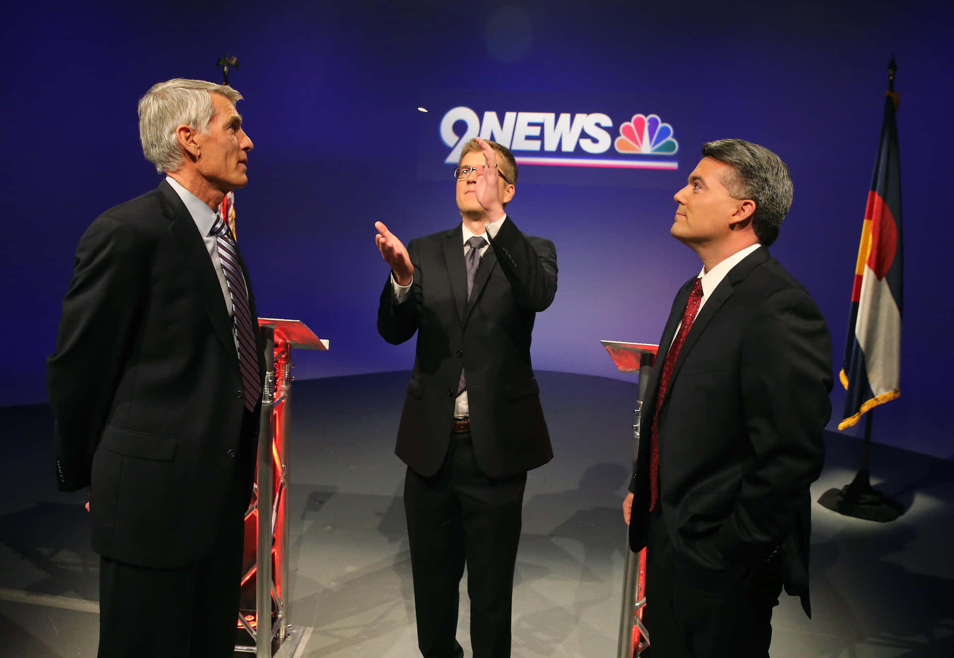Mark Udall On News Background
