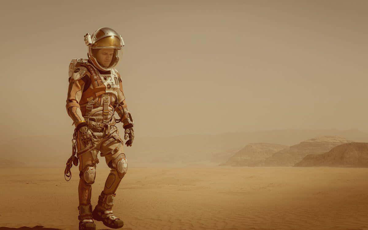 Mark Watney Explores The Martian Landscape In His Rover Background
