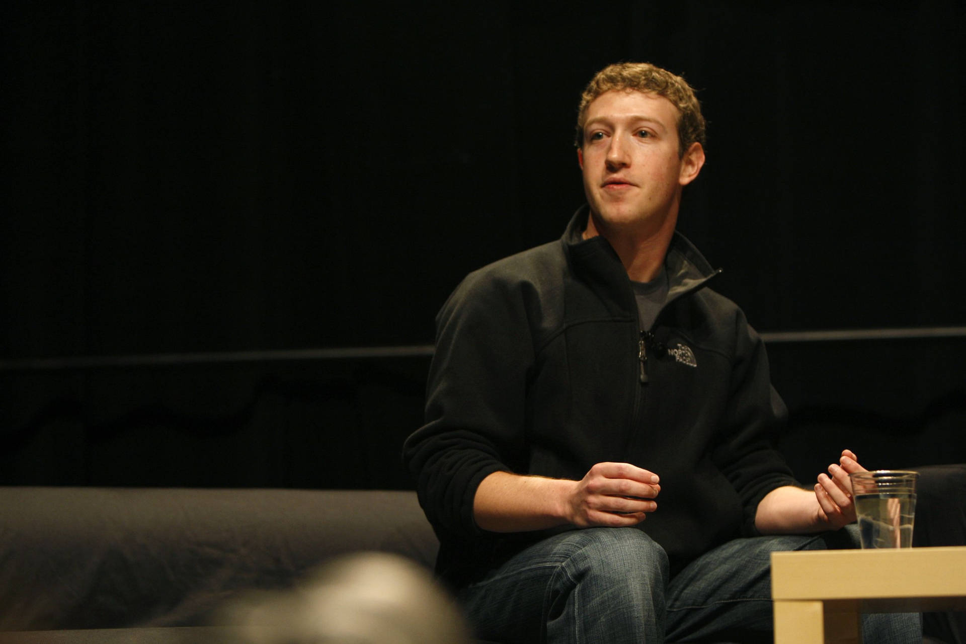 Mark Zuckerberg In A Loose Jacket Background